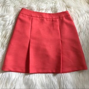 NWT salmon colored mini pleated skirt
